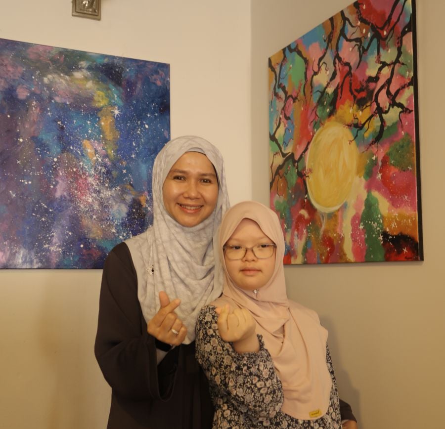 Maryam (right) and her mother, Sharifah Sarah have been making great strides, all thanks to the support from those around them. - NSTP pics