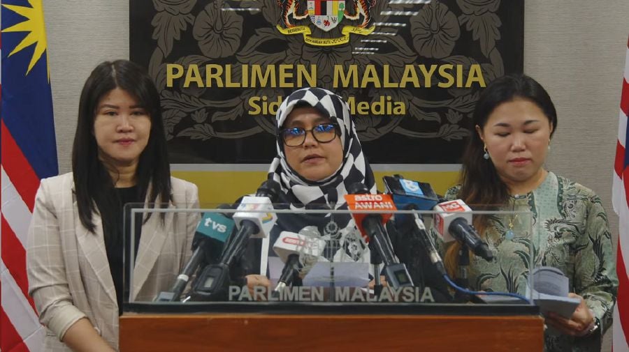  Public Accounts Committee (PAC) chairman Datuk Mas Ermieyati Samsudin (centre) speaks to the media during a press conference in Parliament.