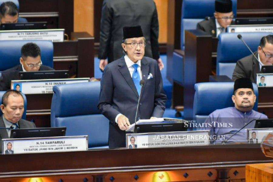 Sabah Finance Minister Datuk Seri Masidi Manjun tabling the state’s 2024 Budget during the state assembly sitting in Kota Kinabalu. -Photo courtesy of Sabah Information Department.