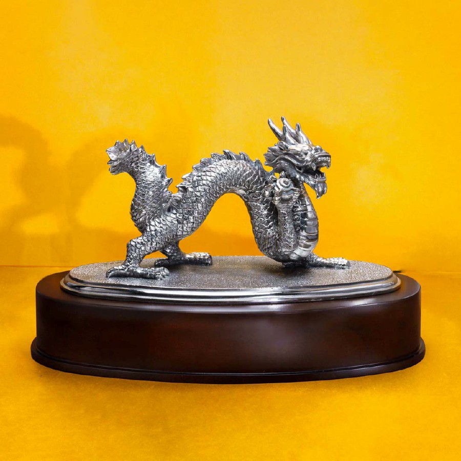 The Dragon Figurine has been intricately designed with antique finishing.