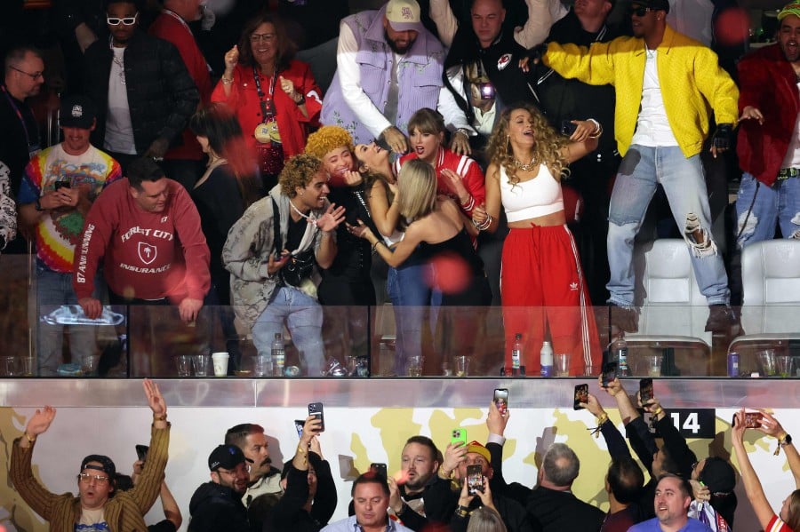  (L-R) Actor Miles Teller, singer Lana Del Rey, singer Ice Spice, singer Taylor Swift, and actress Blake Lively react in overtime during Super Bowl LVIII between the San Francisco 49ers and Kansas City Chiefs at Allegiant Stadium in Las Vegas, Nevada. - AFP PIC