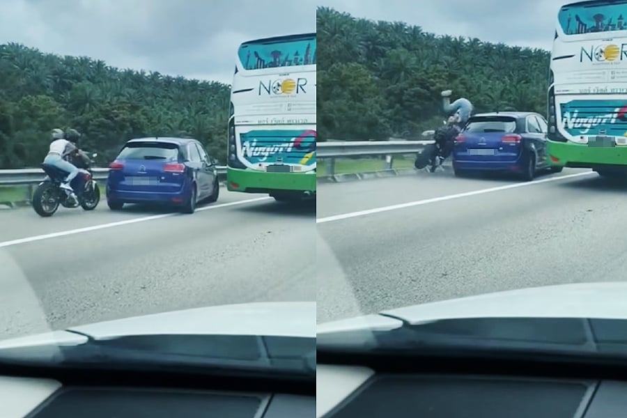 A motorcyclist was thrown off his machine, when a Singapore-registered vehicle driver abruptly changed lanes to the emergency lane without signalling at KM 123.2 of the North-South Expressway, today. - Screengrab from Facebook