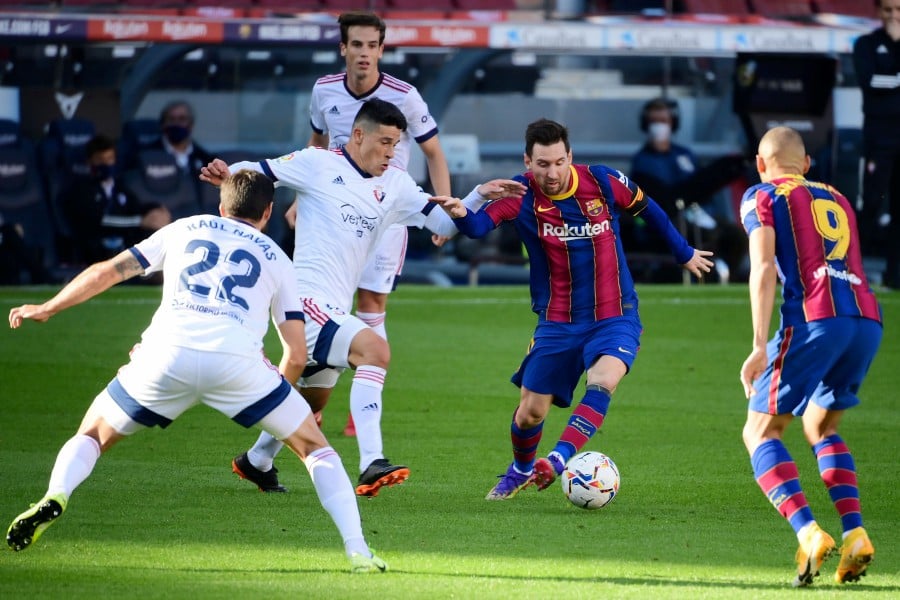 Messi reveals Newell's Old Boys shirt in tribute to Maradona after