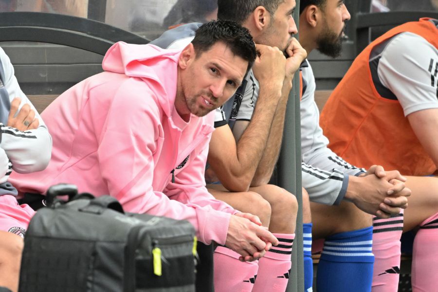 Inter Miami's Argentine forward Lionel Messi (L) sits on the bench during the friendly football match between Hong Kong XI and US Inter Miami CF in Hong Kong on February 4, 2024. Inter Miami were booed off the pitch after their injured superstar Lionel Messi failed to take the field in a pre-season friendly in Hong Kong. - AFP pic