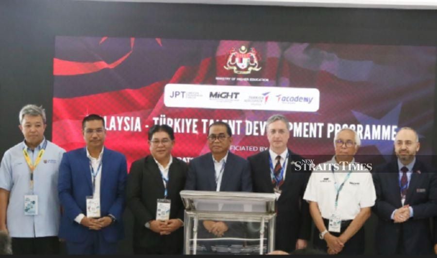 Tan Sri Zakri Abdul Hamid, chairman of MIGHT (second from right) at the launch of the talent development programme yesterday.
