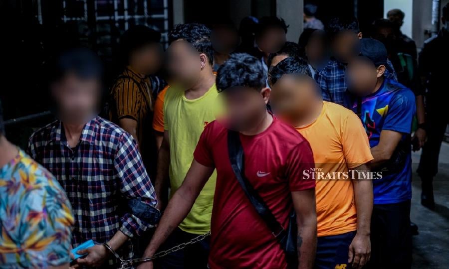 This Dec 30, 2023 file picture, shows undocumented immigrants nabbed during an operation by the Immigration Department at the Abdullah Hukum Apartments in Kuala Lumpur. - NSTP/HAZREEN MOHAMAD