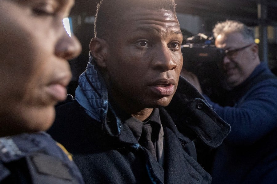 Actor Jonathan Majors walks outside the court after the jury found him guilty in his assault and harassment case at Manhattan Criminal Court in New York City, U.S., December 18, 2023. - REUTERS PIC