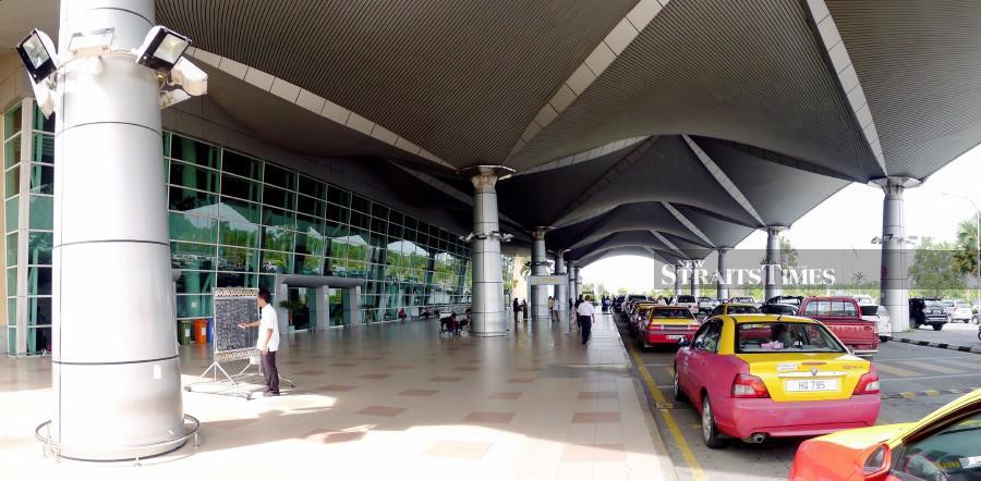 A man was arrested at the Miri Airport today after he told the AirAsia check-in counter staff that he was carrying a bomb in his luggage. (NSTP/KANDAU SIDI)