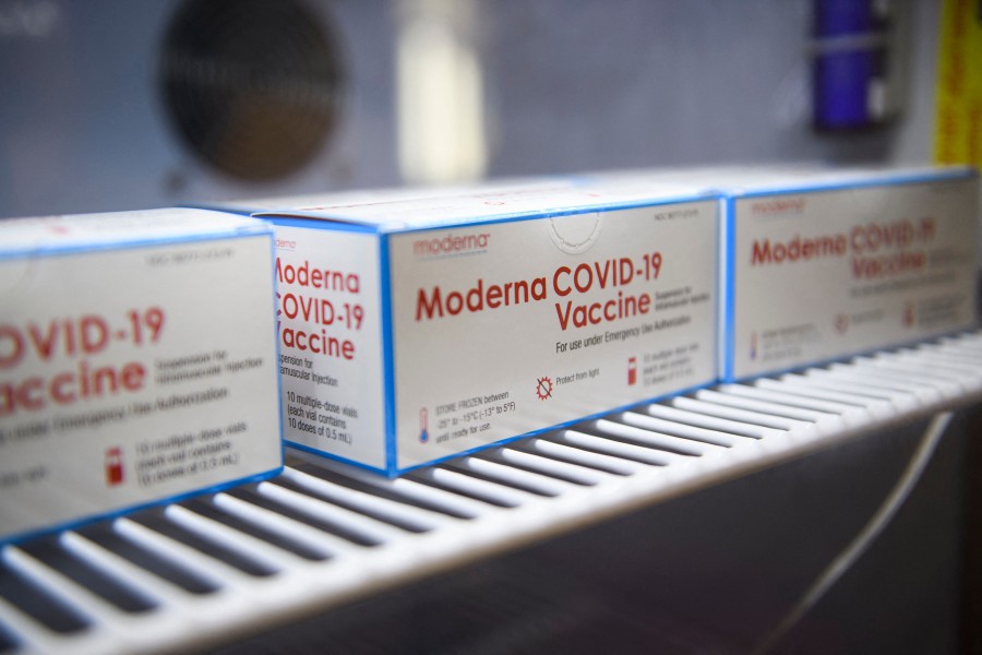  An expert committee recommended a booster dose of Moderna's anti-Covid vaccine in the United States for certain at-risk groups. - AFP PIC