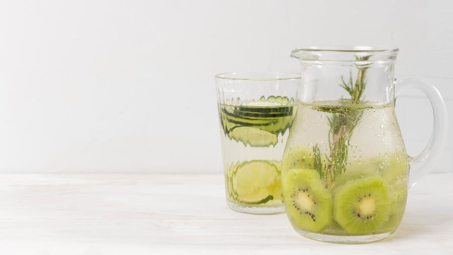 Make it fun and appealing by infusing water with fruits and herbs. Image by Freepik.
