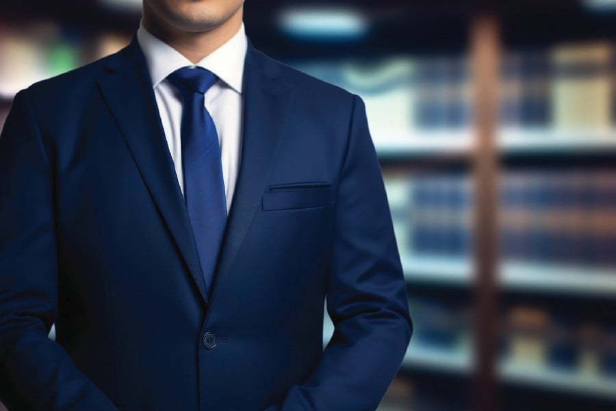 A business suit is part of the dress code in certain industries. Picture Credit: Freepik.