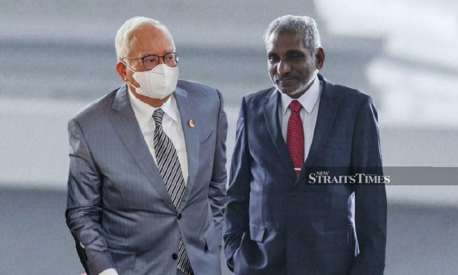 Datuk Seri Najib Razak and Tan Sri Mohd Irwan Serigar Abdullah will both appear in court tomorrow. - NSTP file pic