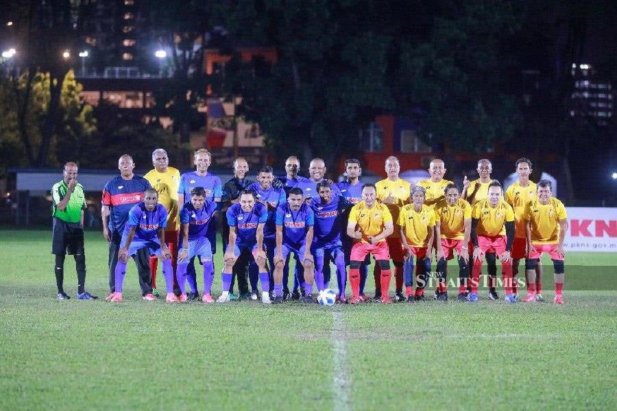 Players attending a charity match for the family of the late Khalid Ali. The match was between his former clubs, Kelab Sultan Sulaiman and PKNS at PKNS Sports Complex in Petaling Jaya yesterday. - Pic from Nasir Yazid