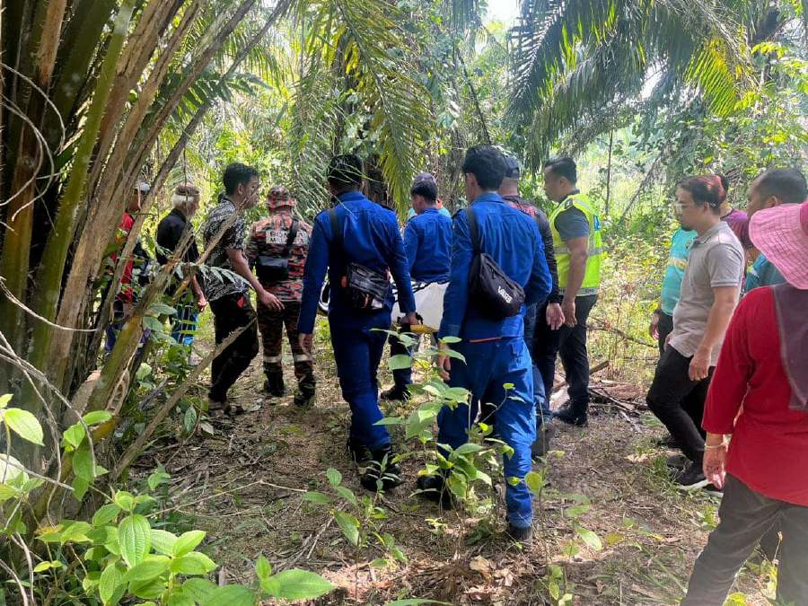 Kamariah Sungkim’s body was found about 1.7km from her home at 2.52pm yesterday, a day after she was reported missing. - Pic courtesy BOMBA