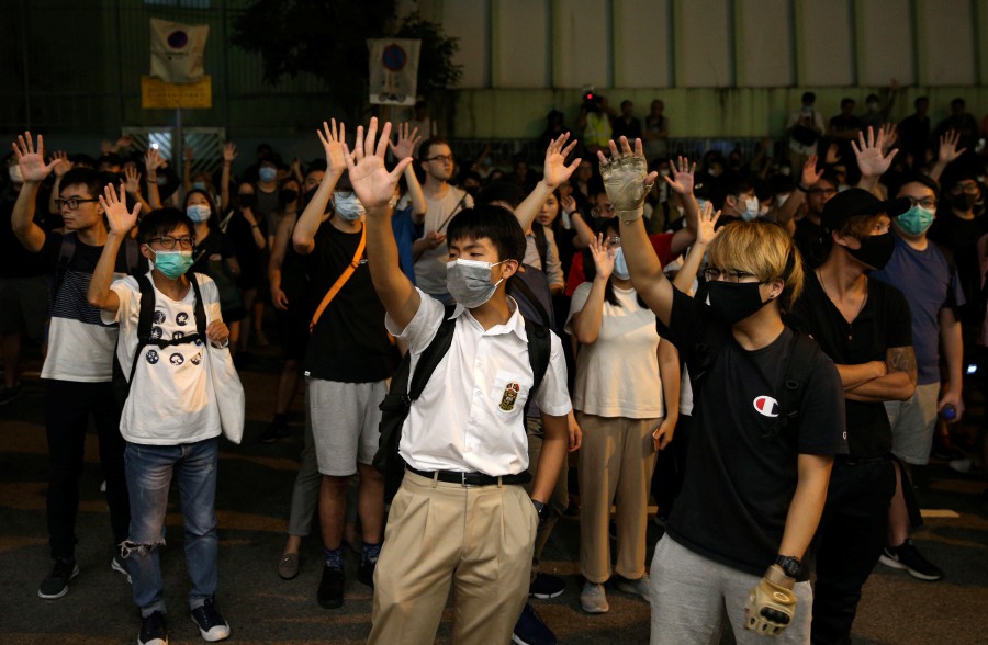 Hong Kong leader endures barrage of anger at town hall meeting | New ...