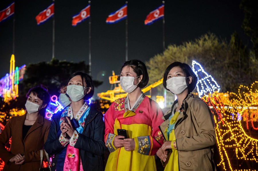 People visit the Light Festival to celebrate the 110th birth anniversary of late North Korean leader Kim Il Sung at Kim Il Sung Square in Pyongyang. -AFP PIC