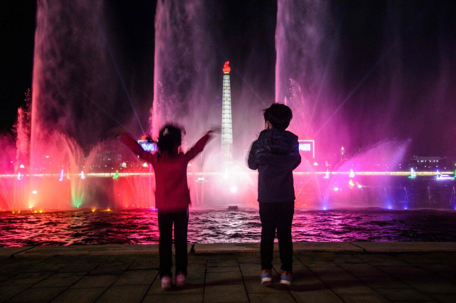 Children visit the Light Festival to celebrate the 110th birth anniversary of late North Korean leader Kim Il Sung at Kim Il Sung Square in Pyongyang. -AFP PIC