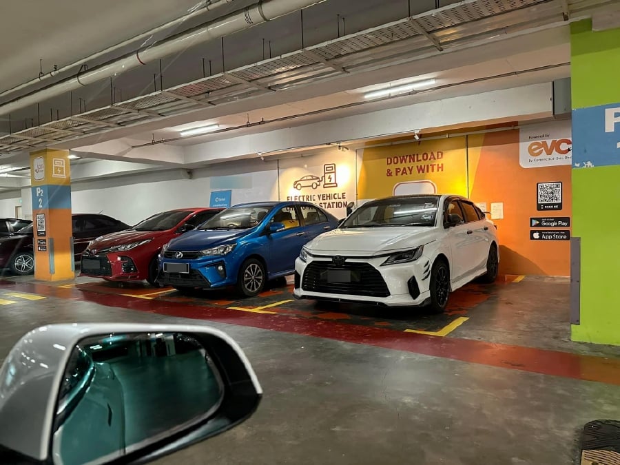 Some petrol-powered vehicles parked at the Electric Vehicle (EV) parking spots. - Pic credit @ohtweet 