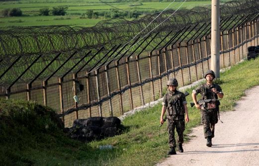 North, South Korean troops exchange border fire | New Straits Times ...