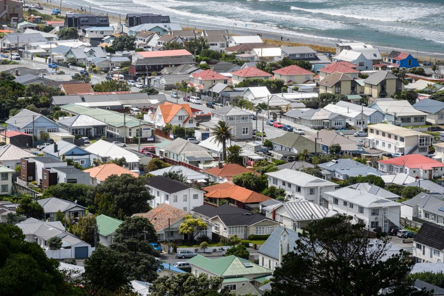 Houses in the Lyall Bay suburb of Wellington, New Zealand, on Saturday, Nov. 28, 2020. A housing frenzy at the bottom of the world is laying bare the perils of ultra-low interest rates. Photographer: Mark Coote/Bloomberg