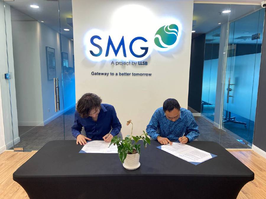 From Left_ The Ocean Cleanup founder and chief executive officer Boyan Slat and LLSB managing director Syaiful Azmen Nordin signing the documents. - Courtesy pic