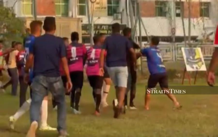 A screengrab from the alleged incident, shows the fight among the football players.
