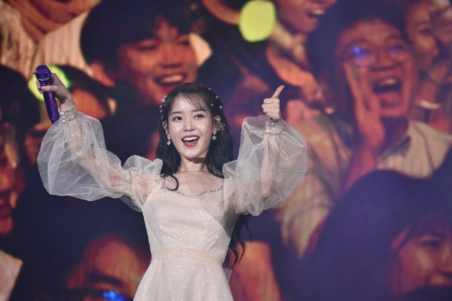 The young K-Pop artiste, IU, was very grateful that her fans sang along loudly to her songs. (Picture courtesy of Galaxy Group)