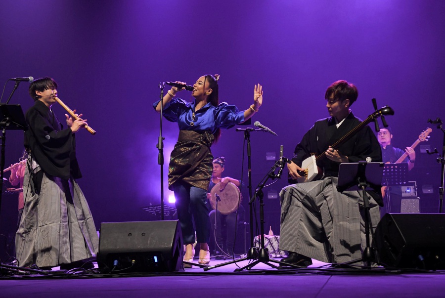 Japan’s Mikage Project and Malaysian asli singer Asmidar performing renditions of classic folk songs from both countries at a recent concert in PJPAC. – Pic courtesy of JFKL