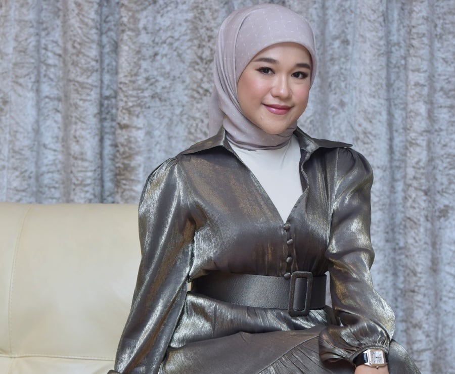 Ernie Zakri says her new Raya song encapsulates the musical vibes of the 1950s, like those sung by the late Saloma. - Pic courtesy of Universal Music Malaysia