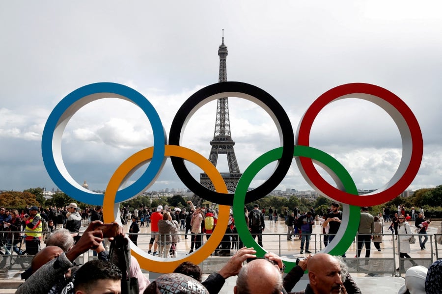 Olympic rings to celebrate the IOC official announcement that Paris won the 2024 Olympic bid are seen in front of the Eiffel Tower at the Trocadero square in Paris, France on Sept 16, 2017. - REUTERS PIC