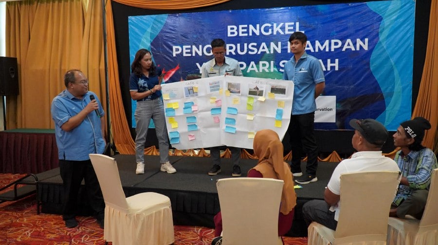 Participants showing their presentation during the Sustainable management of sharks and rays workshop at a hotel here.- Courtesy pic (MRF)