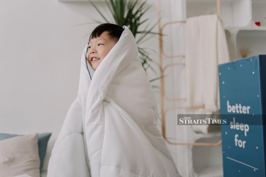 The blanket is designed to be purposeful and playful, like a blanket fortress for kids.