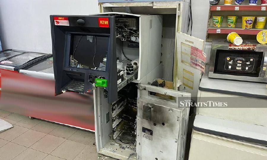  The suspects were believed to have made away with RM260,000 from the blown-up machine.  - Pic courtesy of PDRM 