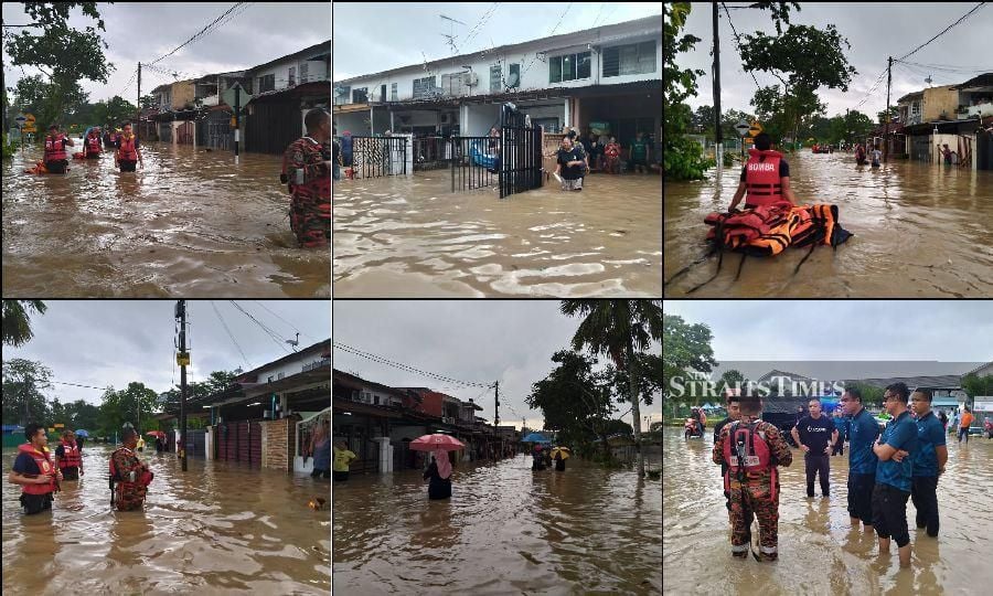 Firemen making their rounds to check on the well-being of residents in Taman Selesa Jaya following the heavy rain. - Pic courtesy of Fire and Rescue Dept.