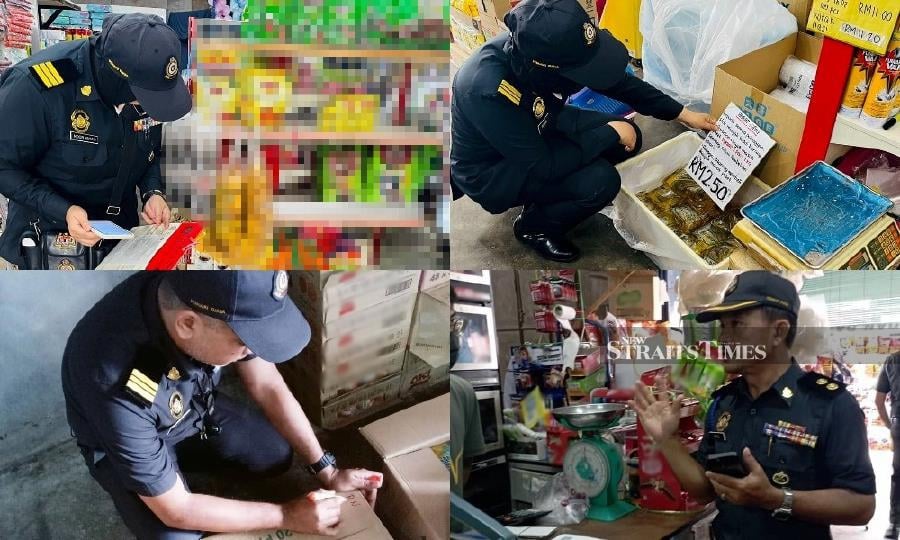 Officers inspecting items sold at the shop in Parit Buntar. - Pic credit KPDN