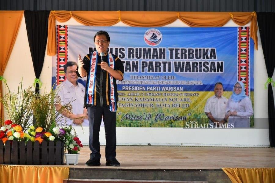 Parti Warisan Sabah's (Warisan) president Datuk Seri Mohd Shafie Apdal delivers his speech during the party's Kaamatan Open House at the Kadamaian Square hall, in Kota Belud. -NSTP/YUN MIKAIL 