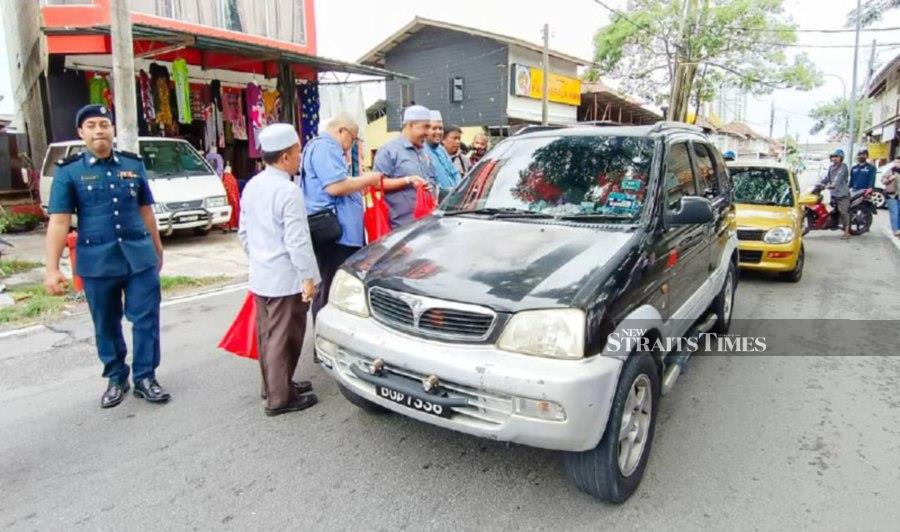 kelantan-exco-no-fine-for-not-displaying-jalur-gemilang-new-straits