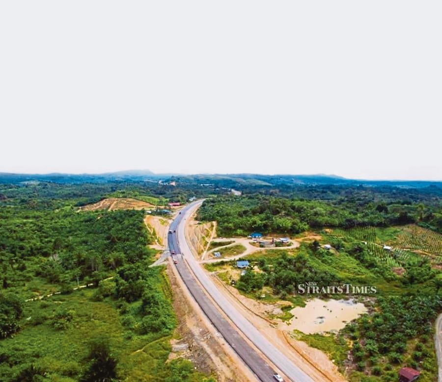 Pan Borneo highway under construction. STR/MELVIN JONI 