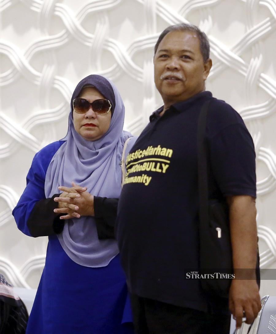 Parents of Zulfarhan Osman Zulkarnain - Zulkarnain Idros (right) and Hawa Osman arrives at the Court of Appeal in Putrajaya. - NSTP/MOHD FADLI HAMZAH