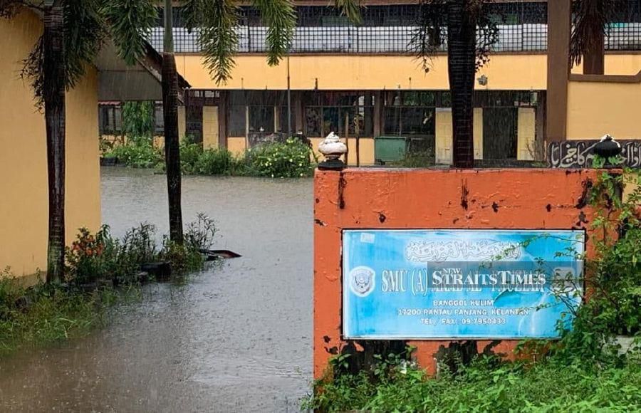 The Islamic Outreach ABIM Kok Lanas in Kota Baru and SK Kubang Kual in Pasir Mas are part of the 12 flood relief centres that have opened to accommodate flood victims, according to the state Welfare Department. - NSTP/SHARIFAH MAHSINAH ABDULLAH. 