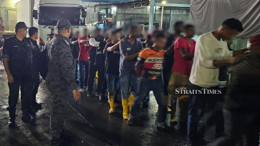 Some of the illegal immigrants nabbed during Op Taring Nyah II in Kuala Lumpur. - Pic courtesy of police.