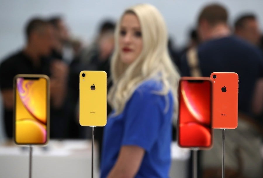 The new Apple iPhone XR is displayed during an Apple special event at the Steve Jobs Theatre on Sept 12 in Cupertino, California. AFP photo