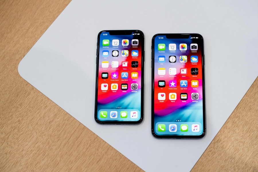 Apple iPhone XS Max (right) and iPhone XS rest on a table during a launch event in Cupertino, California. AFP photo