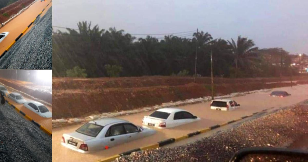 Cars stuck in floodwater as rain batters Melaka | New Straits Times