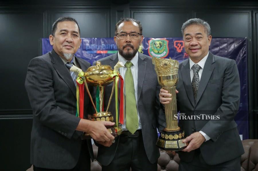 FAM vice president Firdaus Mohamed (center) felt that the Merdeka Tournament was a success despite the pitch at the National Stadium hitting the headlines for the chunks of grass that came flying off during the Malaysia-India game. NSTP FILE PIC