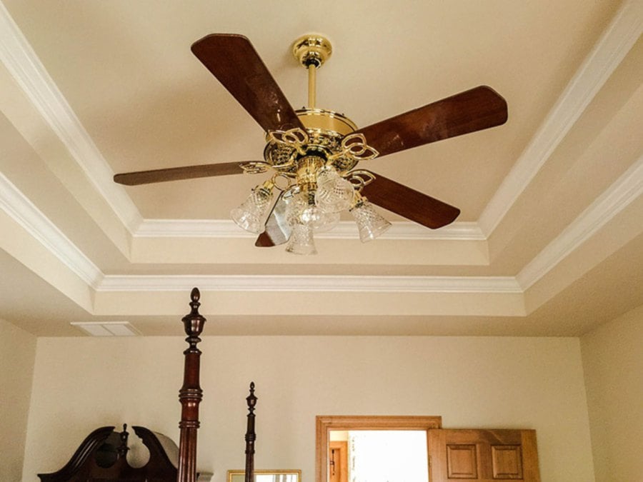 From feng shui point of view, the ceiling fan should not be hung too low in the bedroom or directly above the bed.
