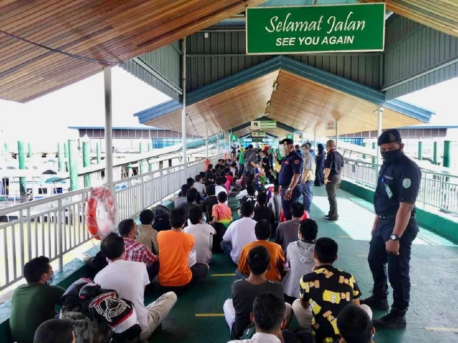 Authorities in Sabah have deported more than half-a-million illegal immigrants to their countries of origin. -Pic courtesy of National Security Council