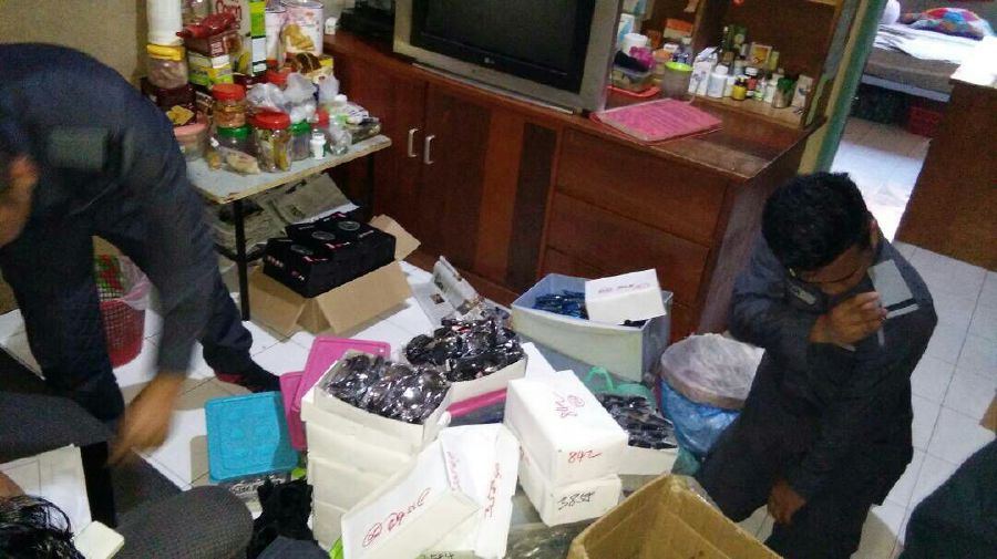 A 71-year-old man was arrested for having in possession 1,998 counterfeit watches of various brands in a raid here, yesterday. (Photo courtesy of Mala­ysian Maritime Enfor­cement Agency)