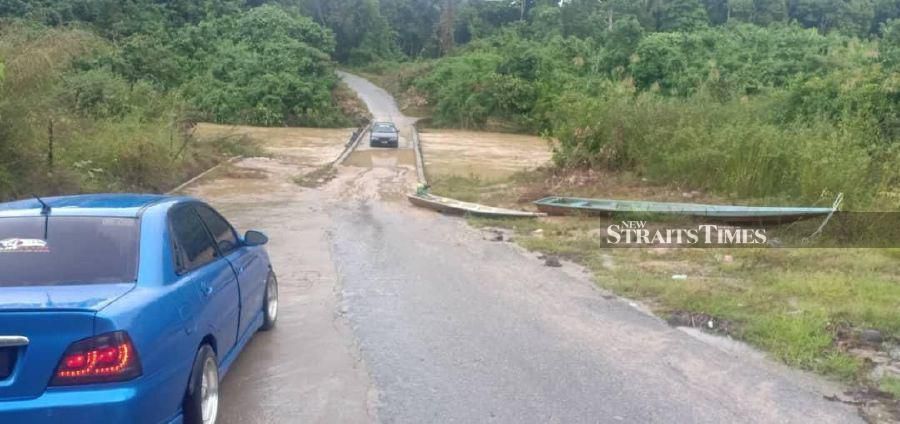 The Kampung Belanga bridge is now accessible to road users. -NSTP/Sharifah Mahsinah Abdullah