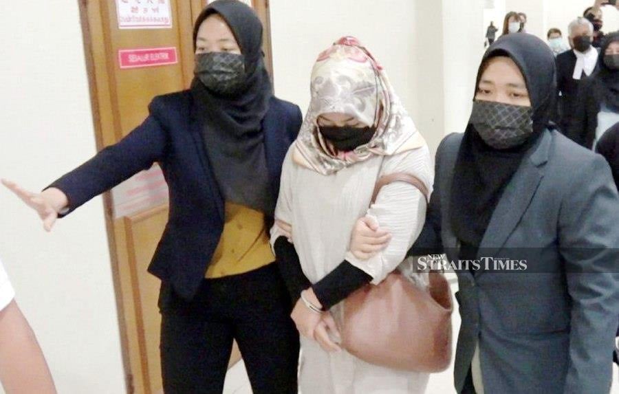 Dayang Kartini Awang Bujang, 46, and cultural performer Mardziana Che Mohd Amin, 36, claimed innocence when the charge was jointly read before Judge Datuk Ahmad Zamzani Mohd Zain.- NSTP/FARIZUL HAFIZ AWANG